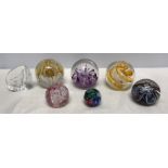 Collection of seven glass paperweights, 2 x Caithness, Mooncrystal and Congratulations. 4 x