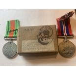 WW II War and Defence medals in original box, Condition ReportVery good condition.