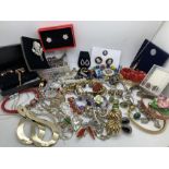 A large quantity of mainly modern costume jewellery including .925 silver, earring bracelets,