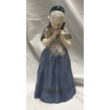Royal Copenhagen Denmark figurine, Girl with pony tails 21.5cms h x 11cms w x 9cms, signed to the