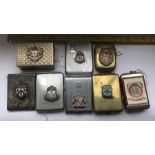 Selection of eight matchbook, matchbox and vesta cases with enamelled town crest badges. One