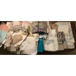 A large quantity of vintage embroidered cloths, chair backs, etc.Condition ReportSome marks to a few