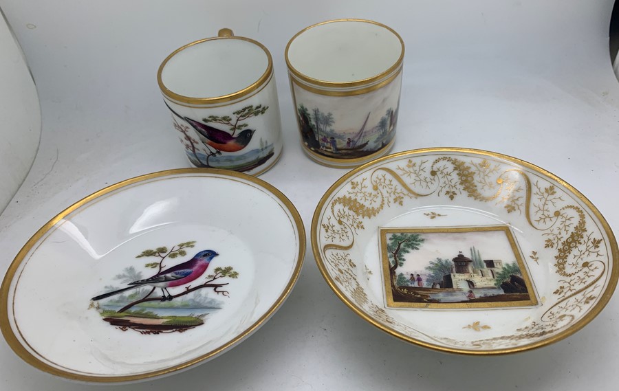 Two cups/saucers comprising a 19thC Meissen ornithological coffee can and saucer with a Paris