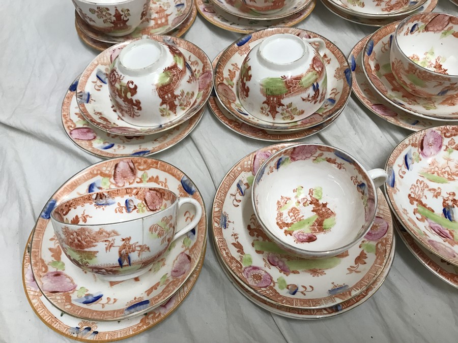 A part tea service, 2 cake plates, jug, 11 cups, 12 saucers, 16 side plates, garden design. 1 bowl. - Image 2 of 4