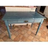 Painted pine table with one drop leaf. 107 w x 58 d x 75cms h, 79cms extended. Condition