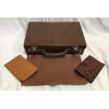 Small brown leather case with fitted compartment interior and writing pad. 36 w x 24 x 9cms d