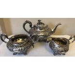 A three piece hallmarked silver tea service, teapot London 1843, possibly William Chawner. sucrier