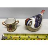 Royal Crown Derby bird paperweight, 9.5cms l, silver stopper and a cup with floral painted