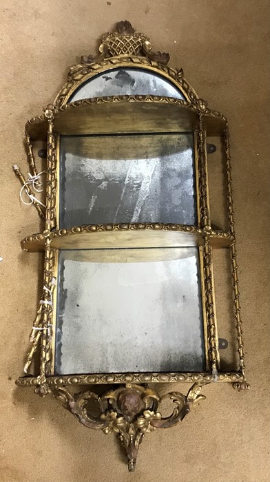 Early 19thC gilded mirror backed carved wood framed wall mounted shelf, 91cms h approx 42cms w and