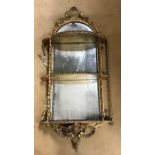 Early 19thC gilded mirror backed carved wood framed wall mounted shelf, 91cms h approx 42cms w and