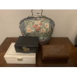 Vintage tea cosy, two jewellery boxes and an Indian wooden box.