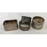 Four silver napkin rings. E.V London 1947, D. Bros Birmingham 1936. J.R Birmingham 1954 and J and