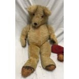 Plush fur, straw filled Teddy bear, large, approx 65cms h. Condition ReportDamage to left hand, both
