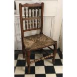 Early 19thC rush seated oak dining chair, turned stretcher on pad feet, height to seat 42cms, height