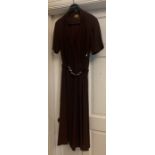 A vintage 1940's brown crepe dress and underslip, labelled Princess frocks size 20, side zip, a gilt