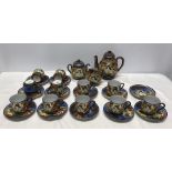 Decorative Japanese tea set, teapot, milk jug, sugar bowl, 11 cups, 12 saucers (26 pieces)