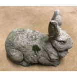 Reconstituted concrete garden ornament Rabbit 22cms h x 29cms l. Condition ReportGood condition.