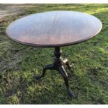 Victorian mahogany circular tip top table, 72cms h x 84cms w, pedestal base, tripod legs.