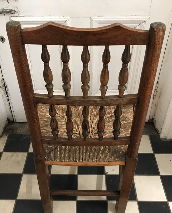 Early 19thC rush seated oak dining chair, turned stretcher on pad feet, height to seat 42cms, height - Image 5 of 5