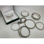 Nine various mainly hallmarked silver bangles and bracelets including Charles Horner, Chester, total