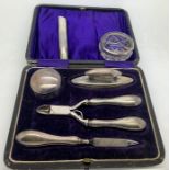 Cased silver and steel manicure set Birmingham 1912/13, a silver topped glass salt and a cocktail