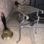 A 19thC brass & iron trivet with brass hand bell. 49cms h.Condition ReportBoth good condition,