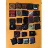 Collection of 27 leather and plastic matchbook purses, most with matchbooks inside. Condition