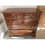 A 19thC mahogany chest of drawers, 2 short over 3 long drawers, drop handles and ivory escutcheons