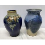 Royal Doulton blue ground fruit pattern vase, 21cms h and a Beverley pottery vase stamped TW,