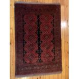 A good quality deep red ground rug. 202 x 129cms.Condition ReportGood condtion.