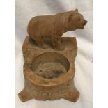 Small black forest carved bear Beckenried, Switzerland, 9cms h, base 8cms w, 10cms d. Condition