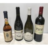 Four various bottles of wine. Saint lion Grand Cru 2006, 750ml. Puligny Montrachet 2009, 750ml,