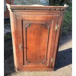 Oak corner cupboard, panelled door, 3 shelf interior, 68 w x 99cms h. Condition ReportLoose