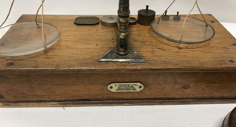 Brass set of balance scales with oak drawer base, label to the back for A Franks Ltd Opticians, - Image 3 of 3