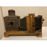 Thornton Pickard MCC No.6 oak projector with brass lens. 74cms l. Condition ReportUnrestored.