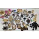 A quantity of mainly vintage brooches with pendant and Blue John tie pin, some marked .925