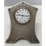 Small silver clock, Birmingham 1928, silver engine turned panel on wood backing, lever stamp to