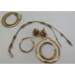 A 9ct gold bracelet, three 9ct odd hoop earrings, a pair of 9ct knot earrings and and two unmarked