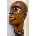 An African carved tribal figural walking stick/cane.