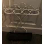 Wrought iron stick stand. 65 h x 51 w x 15cms d.Condition ReportGeneral wear and tear.