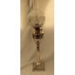 A silver plated oil lamp with a Corinthian column base. Gold and Silver Smiths Company, Regent St.