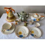 A selection of ceramics to include a green Carlton Ware teapot, a hand painted Myott & Son jug, a