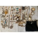 A quantity of vintage costume jewellery to include black evening bag, silver filigree pendants,