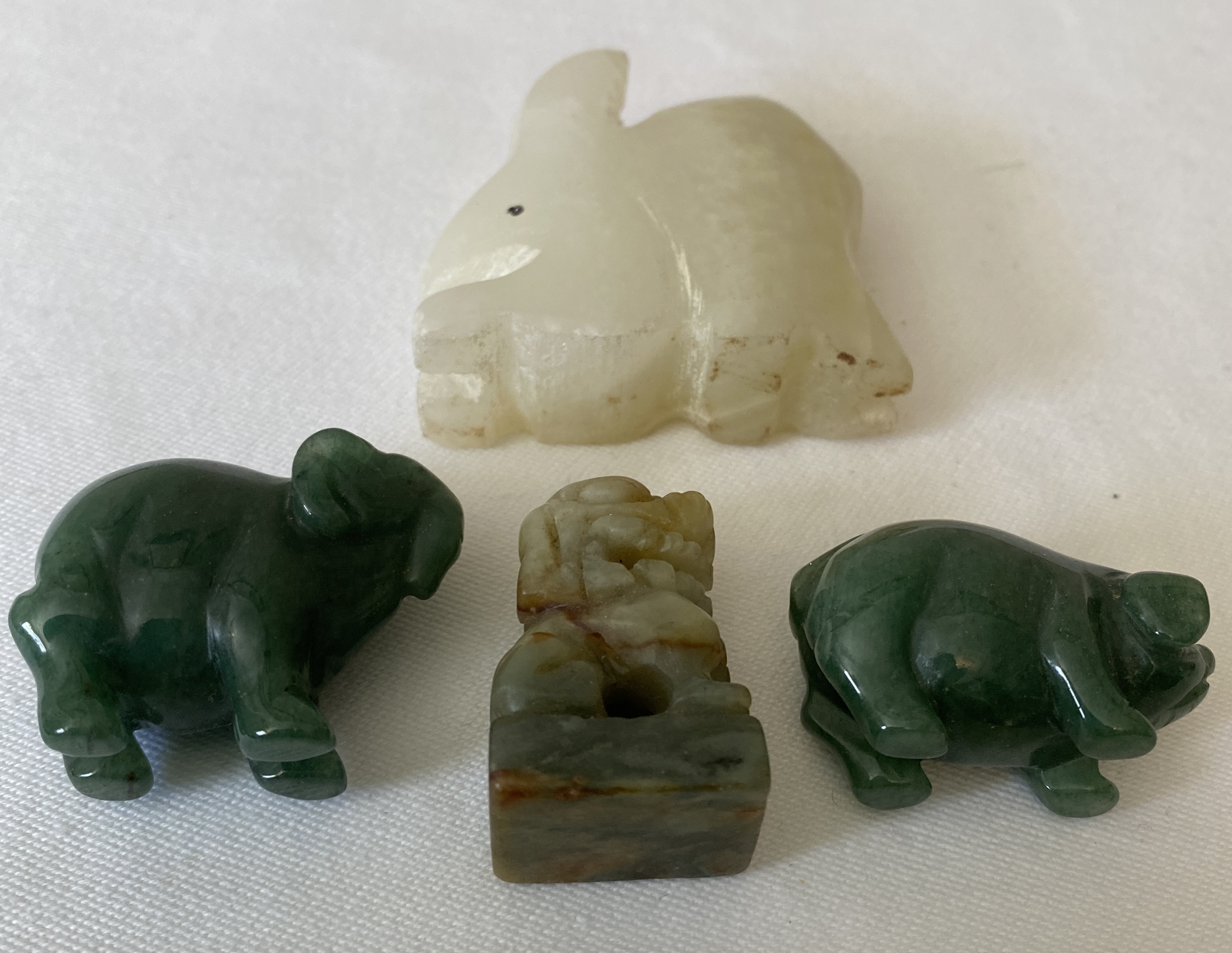 Four various green stone animals to include pig , elephant, rabbit and dog of fo. Rabbit 5.5cms h. - Image 2 of 2