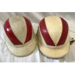 A pair of Chas Owen Co Skulgrade Motorcycle helmets, white and red stripe, 1950's.Condition