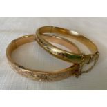 Two 9ct gold etched hinged bangles both with safety chains. 20.6 gms.Condition ReportDents to both