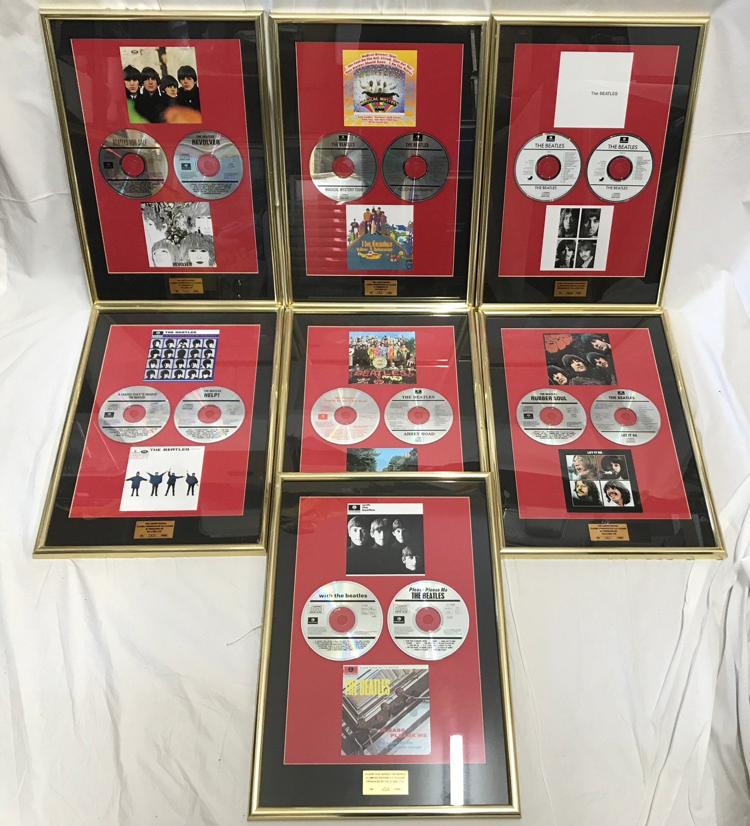 Framed The Beatles CD and sleeves presented by Pic-a-disc Ltd, The Magical Mystery Tour and Yellow