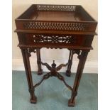 A 20thC mahogany fret work decorated side table. 32cms square top x 68cms h.Condition ReportGood