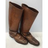 A pair of brown leather riding boots, unknown size. Heel to toe approx. 29cms x 43cms h.Condition