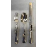 A Silver cutlery set, Sheffield 1910 L BRS Ltd with ergonomic design possibly for infants due to